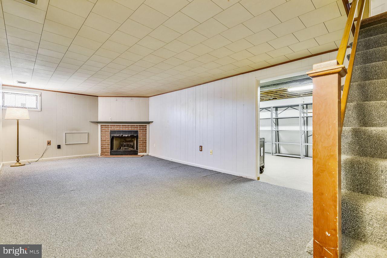 8708 Ashford Road Baltimore, MD 21234 - Photo 19 of 31 Family Room with Gas Fireplace
