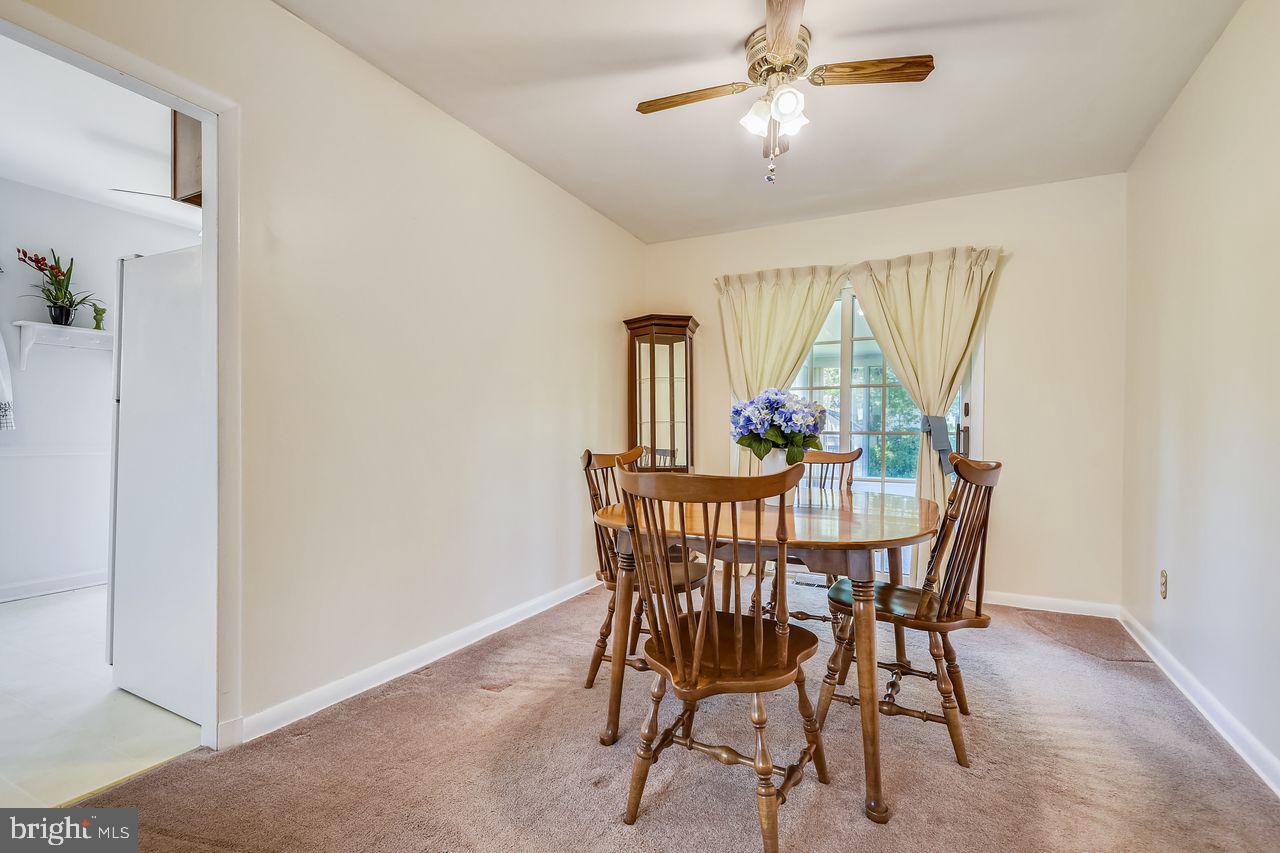 8708 Ashford Road Baltimore, MD 21234 - Photo 8 of 31 Dining Room opens to Sunroom