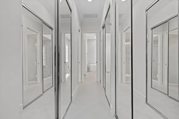 a view of a bathroom from the hallway