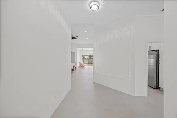 a view of a hallway with closet