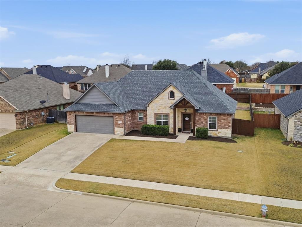 810 Chestnut Grove Drive Cleburne, TX 76033 - Photo 4 of 40 an aerial view of a house