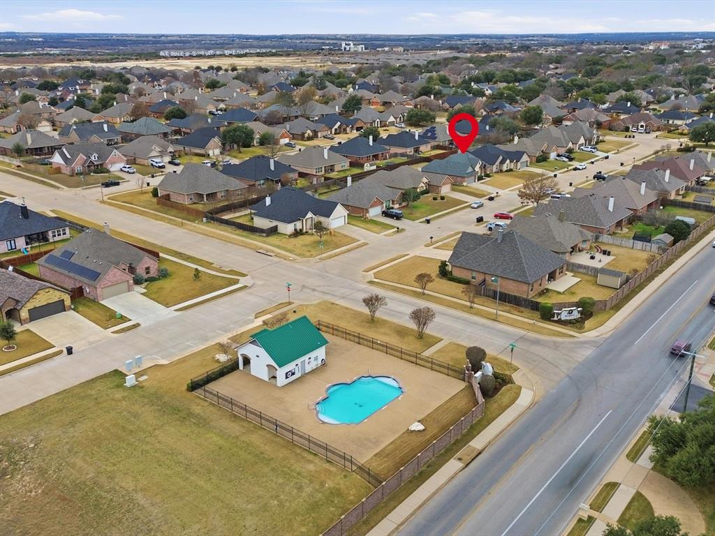 810 Chestnut Grove Drive Cleburne, TX 76033 - Photo 6 of 40 an aerial view of residential houses with outdoor space