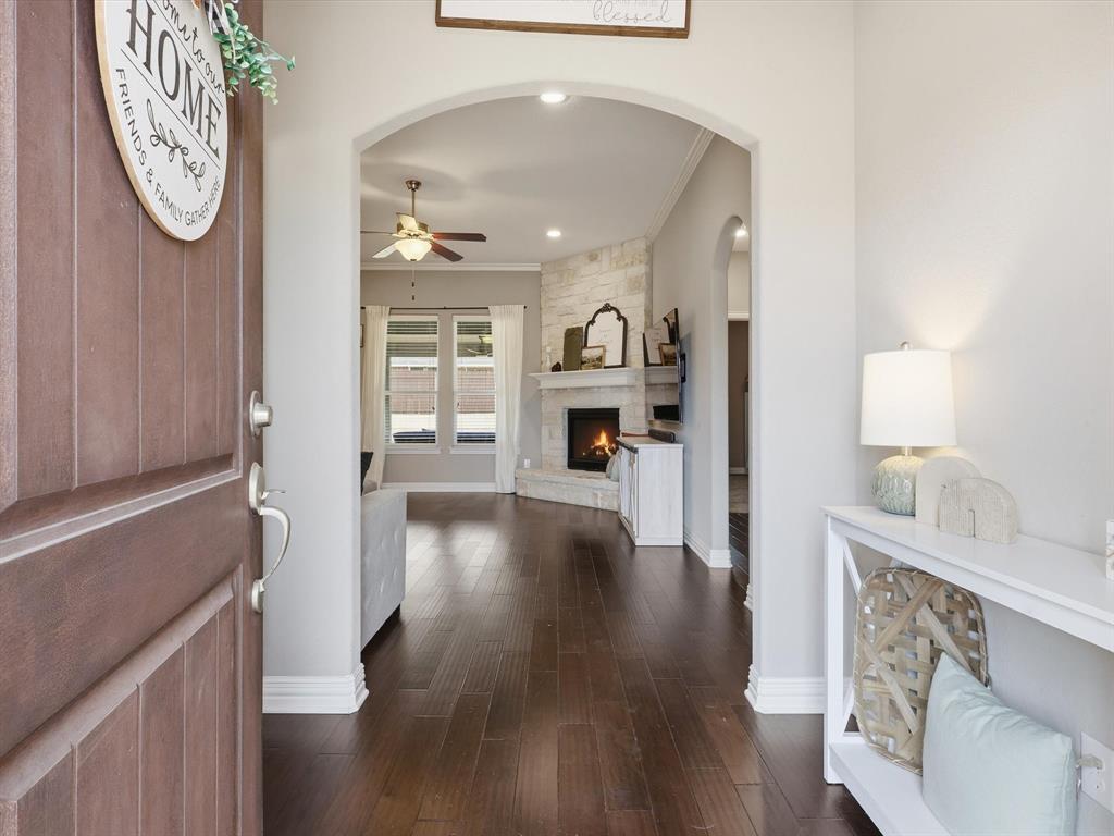 810 Chestnut Grove Drive Cleburne, TX 76033 - Photo 8 of 40 a view of an entryway with wooden floor