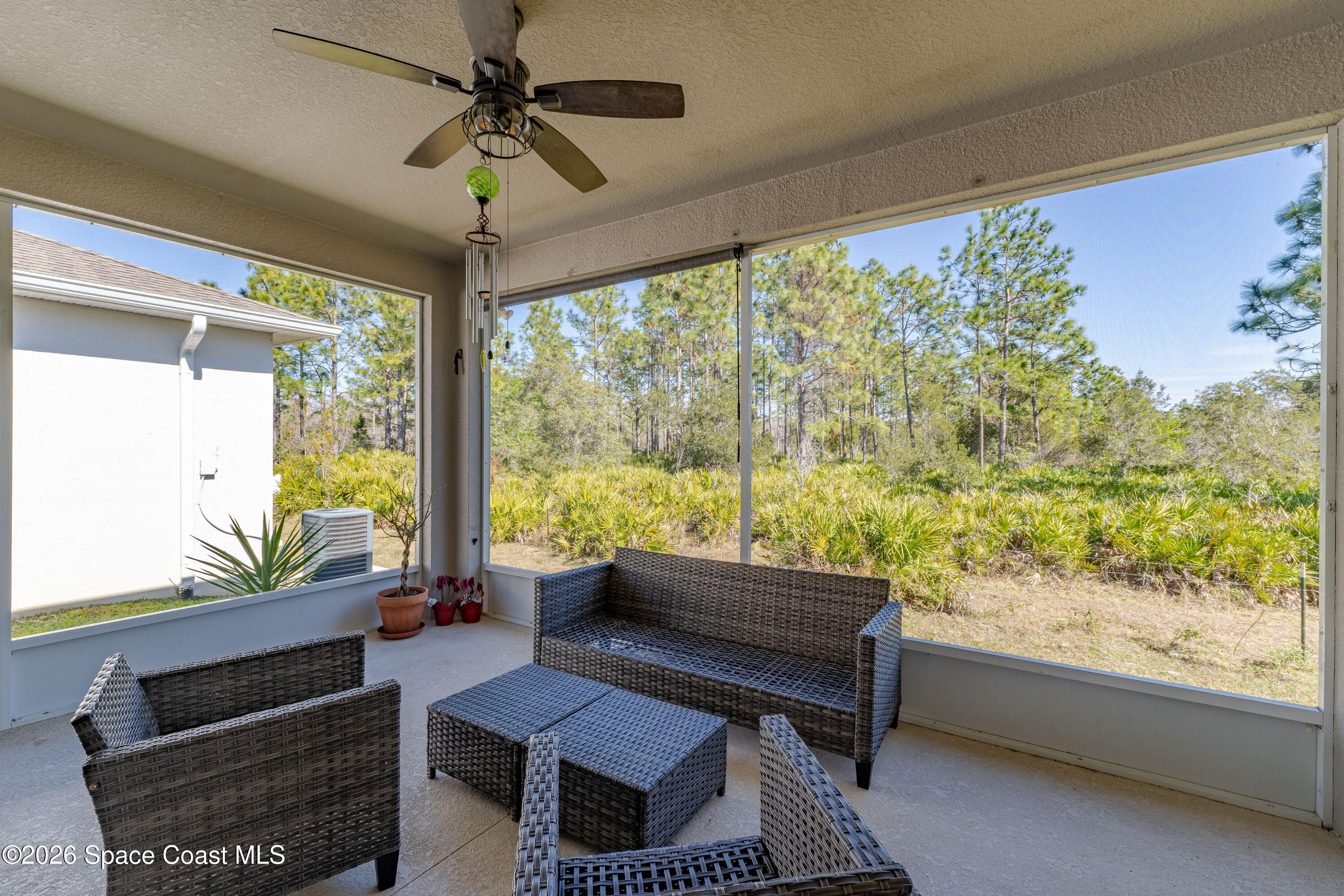 4342 Southern Vista Loop St. Cloud, FL 34772 - Photo 24 of 30 a living room with furniture and a large window