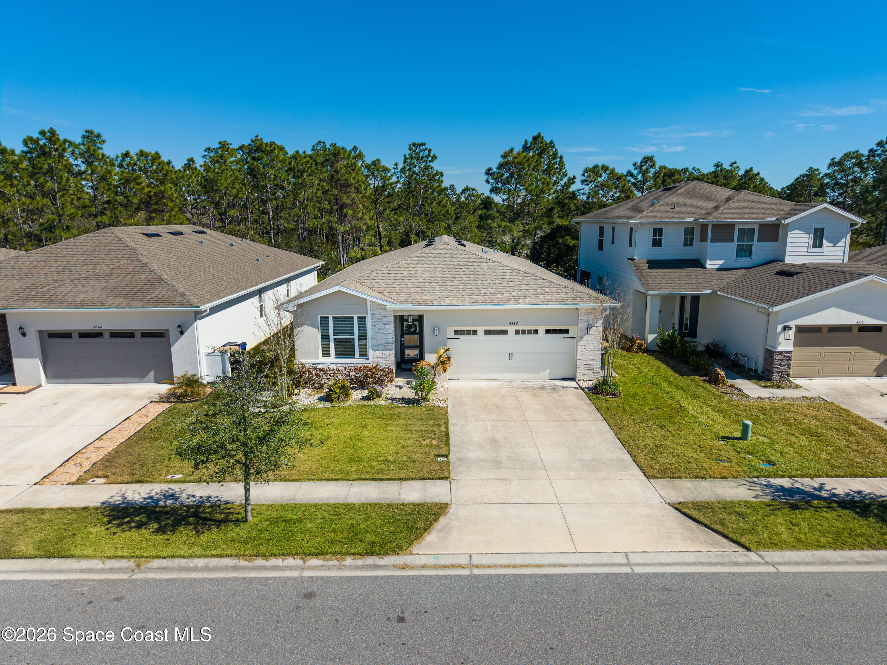 4342 Southern Vista Loop St. Cloud, FL 34772 - Photo 25 of 30 front view of house with a yard