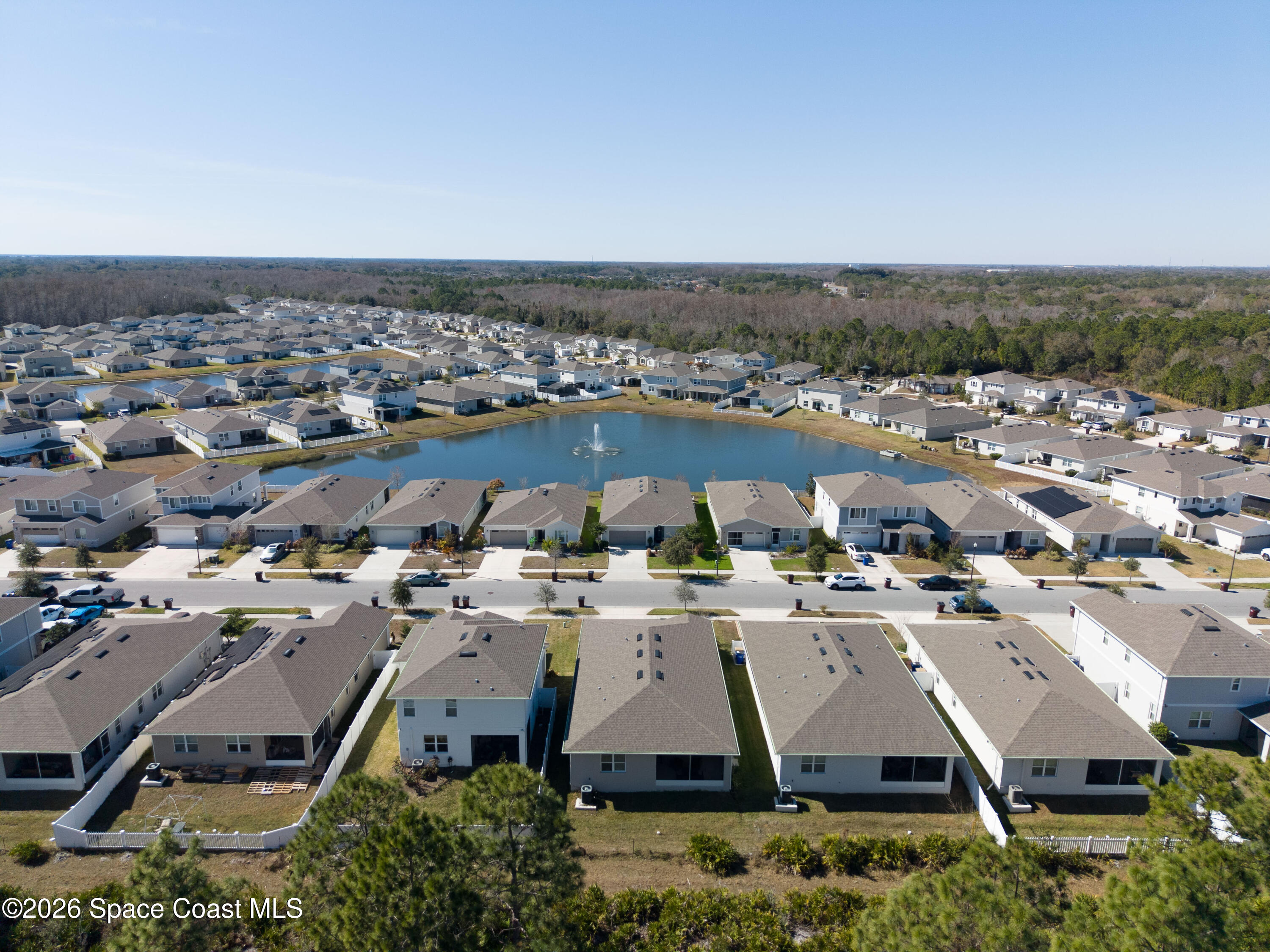 4342 Southern Vista Loop St. Cloud, FL 34772 - Photo 28 of 30 an aerial view of a house with a garden