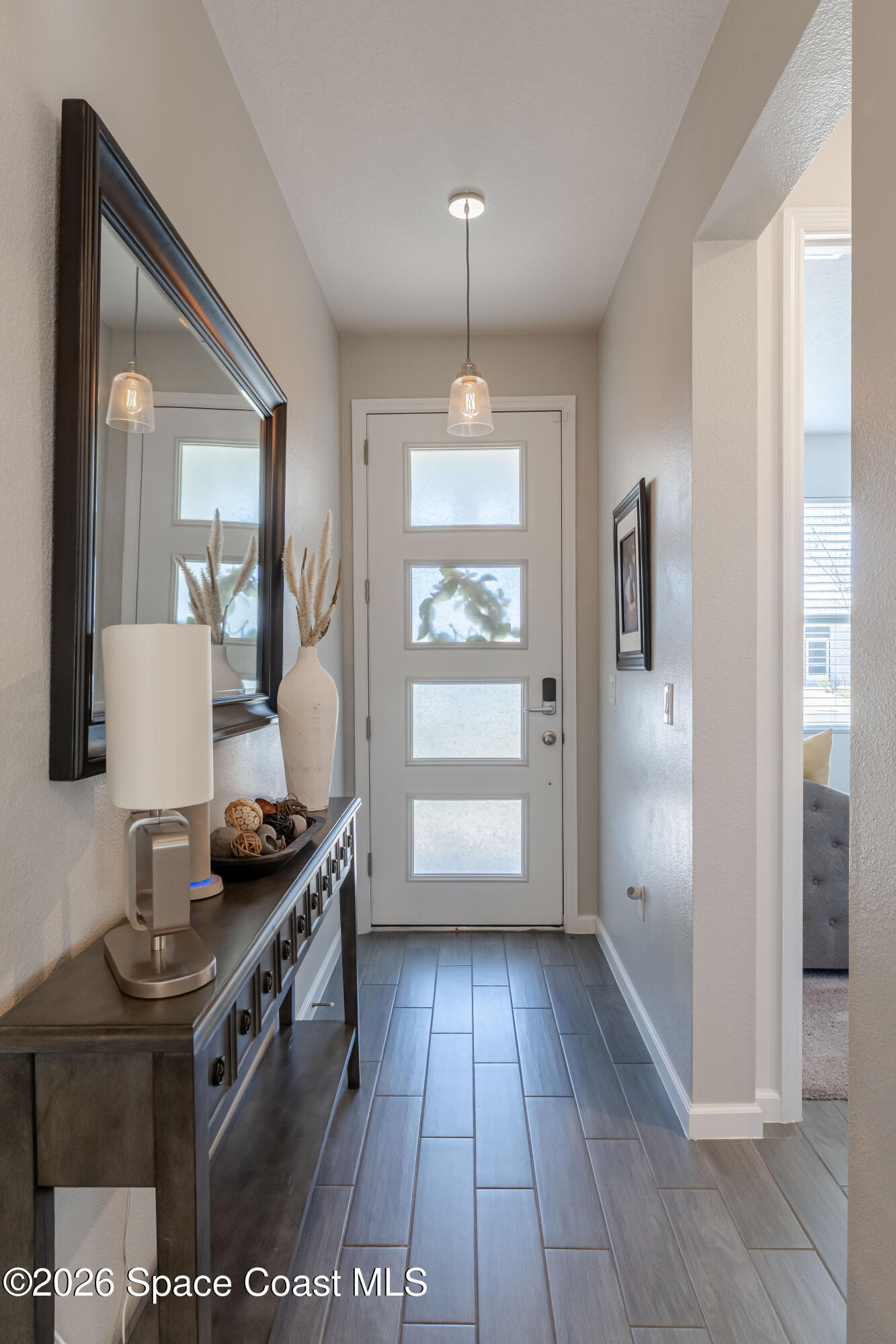 4342 Southern Vista Loop St. Cloud, FL 34772 - Photo 3 of 30 a view of kitchen with windows and refrigerator