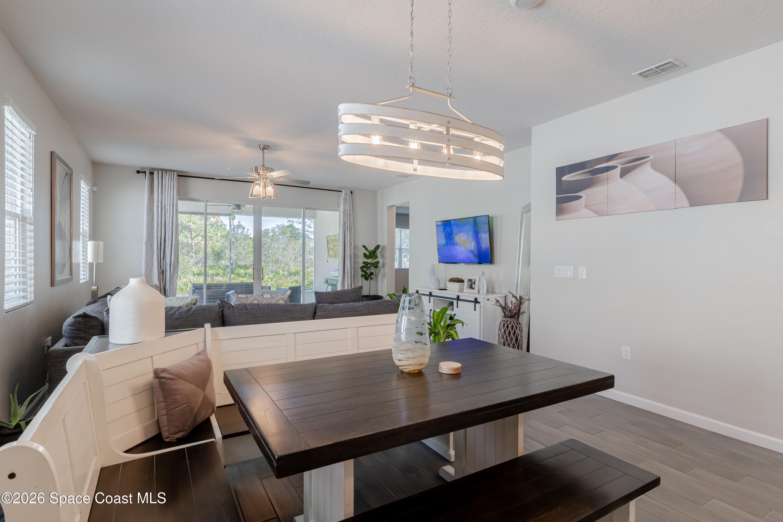 4342 Southern Vista Loop St. Cloud, FL 34772 - Photo 10 of 30 a view of a dining room with furniture and window