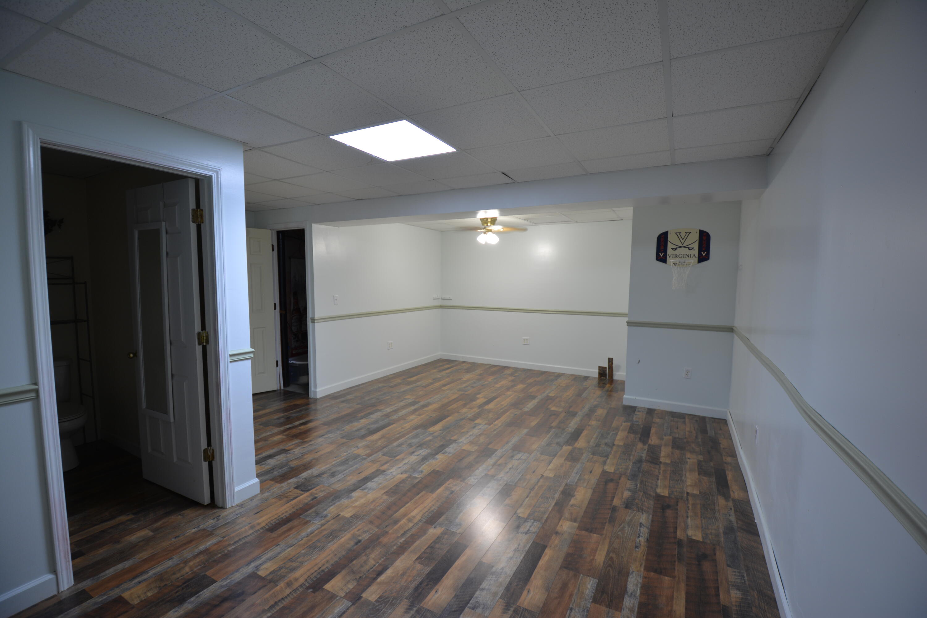 6880 Fork Mountain Road Rocky Mount, VA 24151 - Photo 17 of 22 a view of empty room with wooden floor