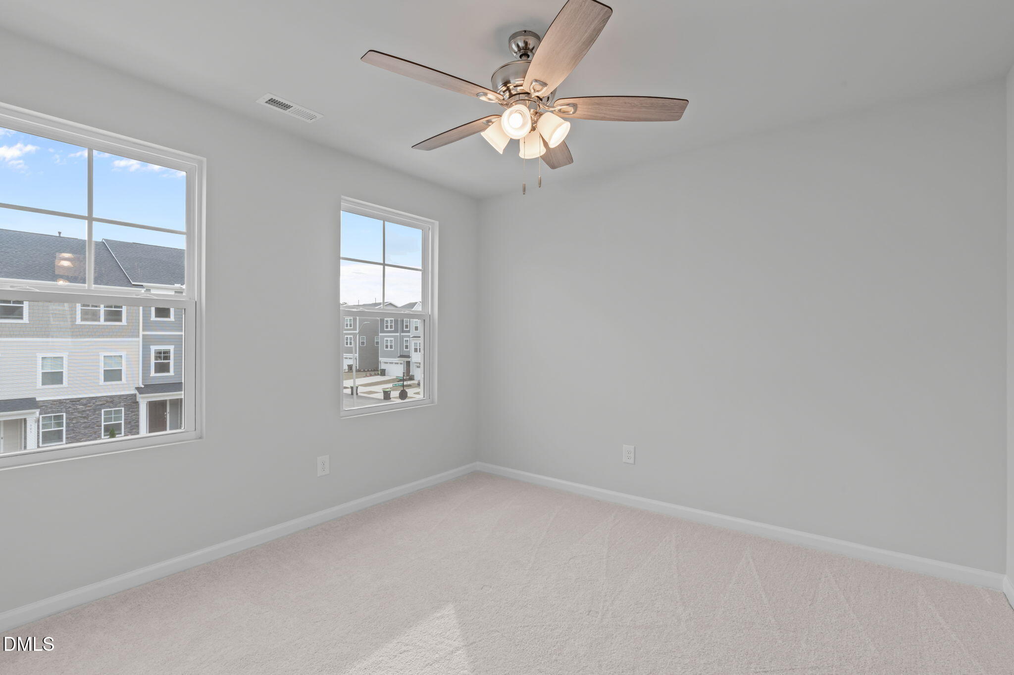 504 Light Oak Way Apex, NC 27539 - Photo 25 of 38 a view of an empty room with a window