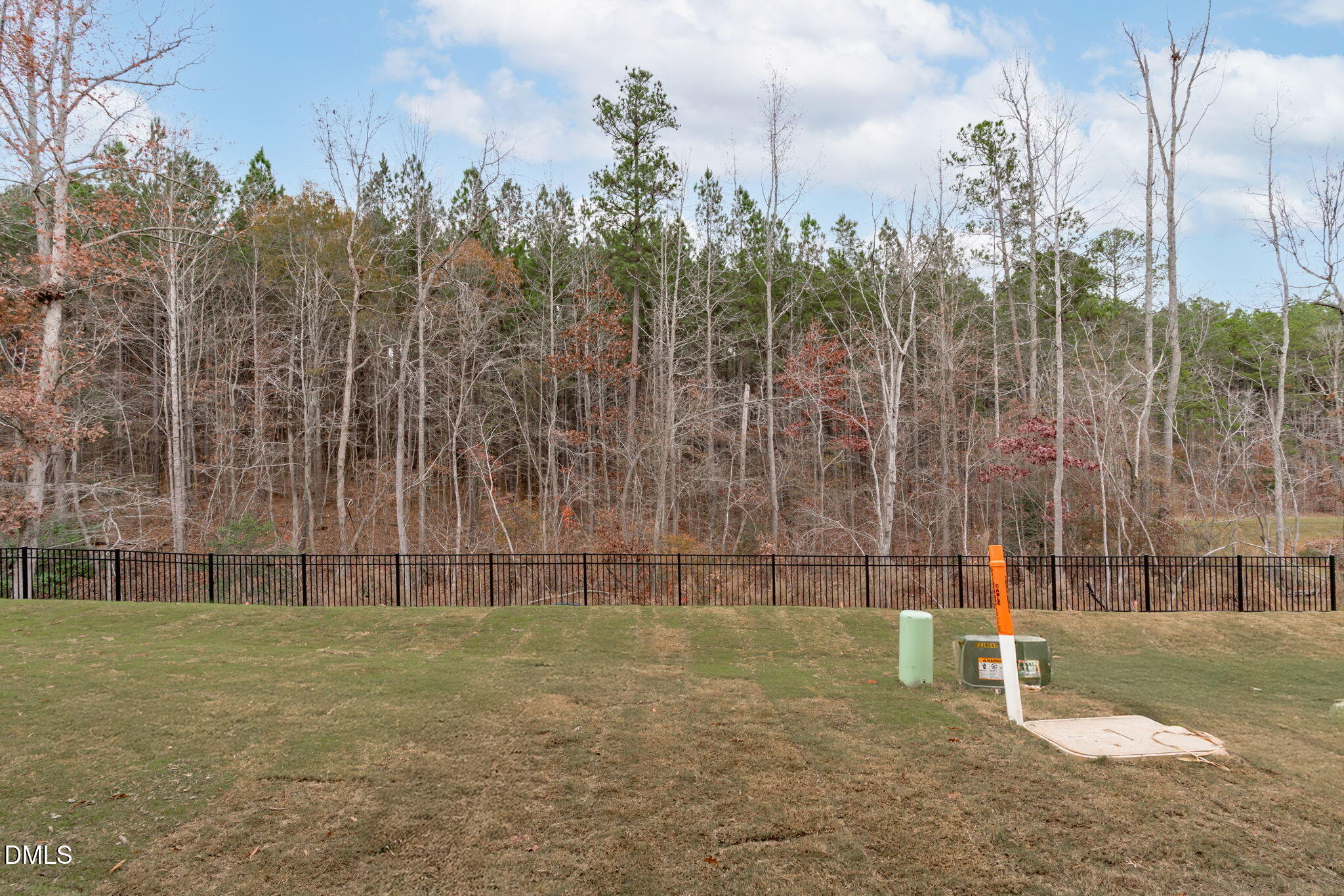 504 Light Oak Way Apex, NC 27539 - Photo 34 of 38 a garden with trees in front of it