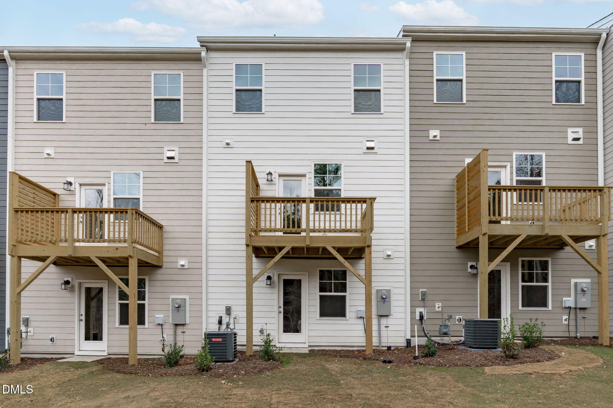 504 Light Oak Way Apex, NC 27539 - Photo 35 of 38 a front view of residential houses with street