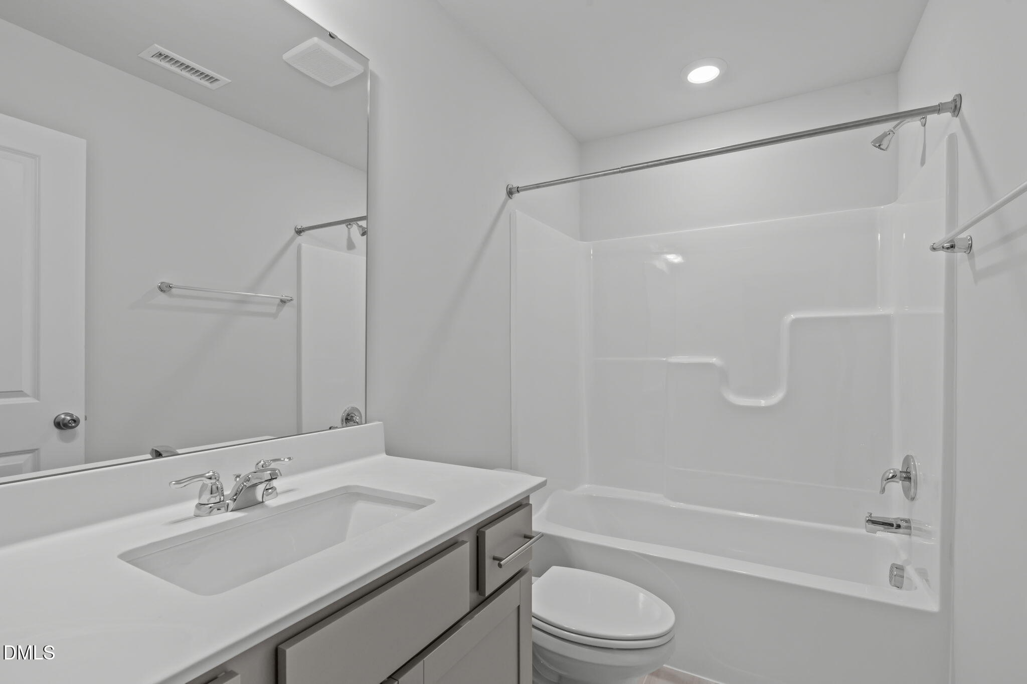 504 Light Oak Way Apex, NC 27539 - Photo 9 of 38 a bathroom with a sink toilet tub and shower