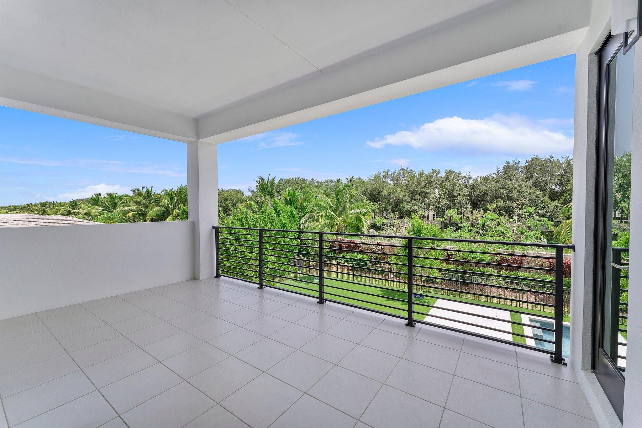9626 Vescovato Way Boca Raton, FL 33496 - Photo 43 of 72 balcony off primary bedroom and loft