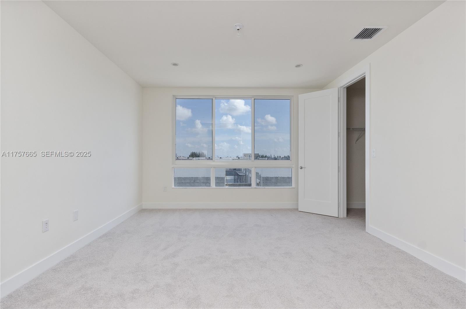 Doral Doral, FL 33178 - Photo 15 of 22 a view of an empty room with a window