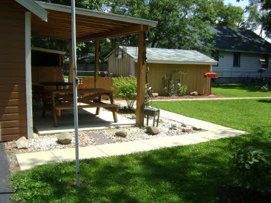 502 Barry Road Rockford, IL 61109 - Photo 4 of 9 a view of a house with backyard