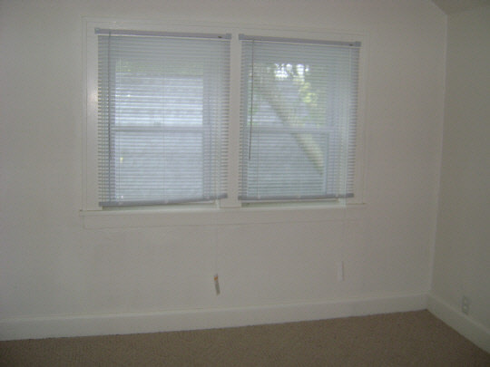 502 Barry Road Rockford, IL 61109 - Photo 5 of 9 a bathroom with a window