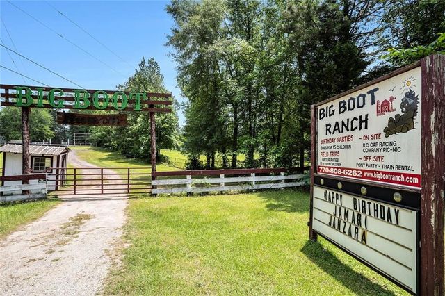 a view of swimming pool with chairs