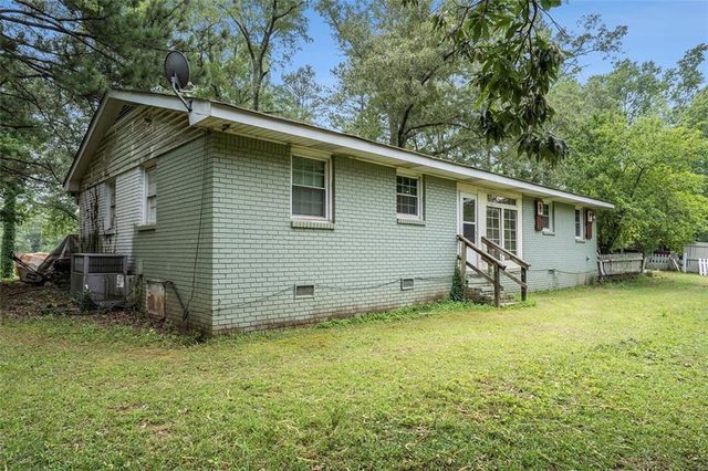 a view of a backyard with a garden