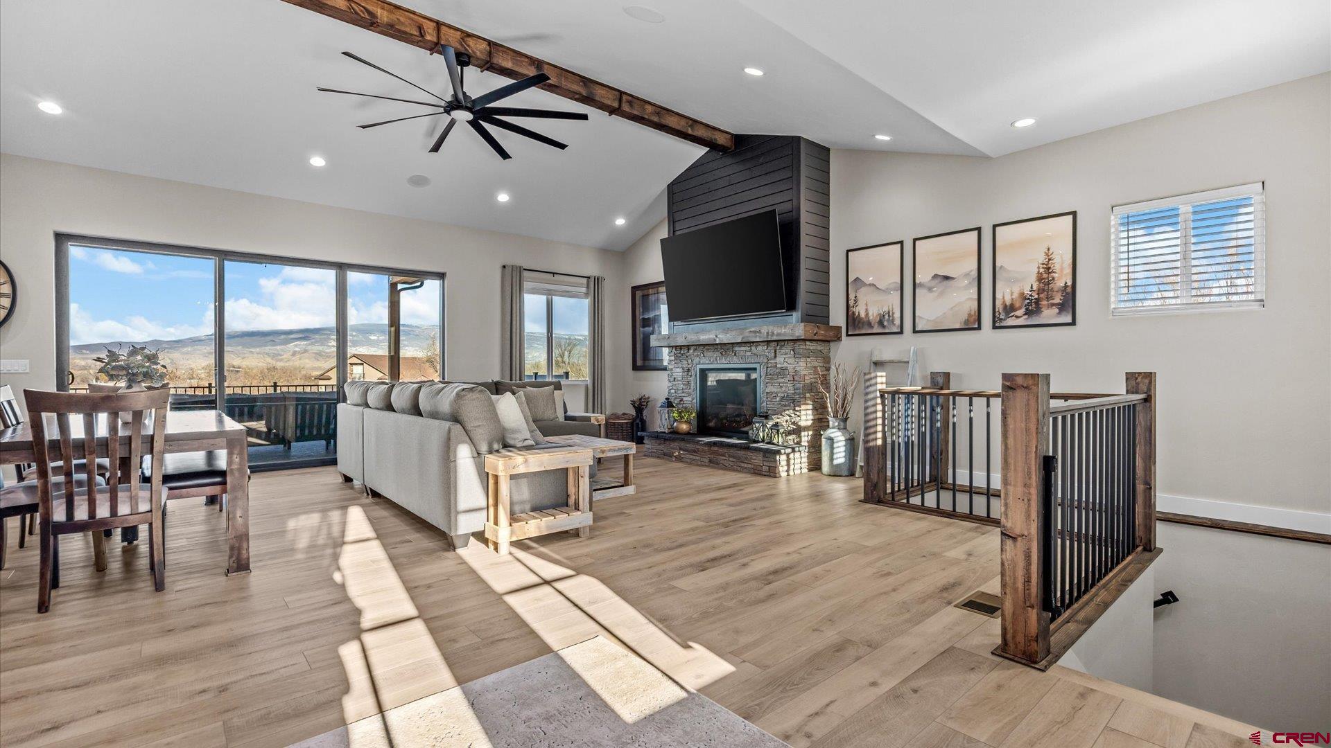 1774 Trapper Court Delta, CO 81416 - Photo 8 of 45 Beautiful fireplace focal point. And it puts out heat too!