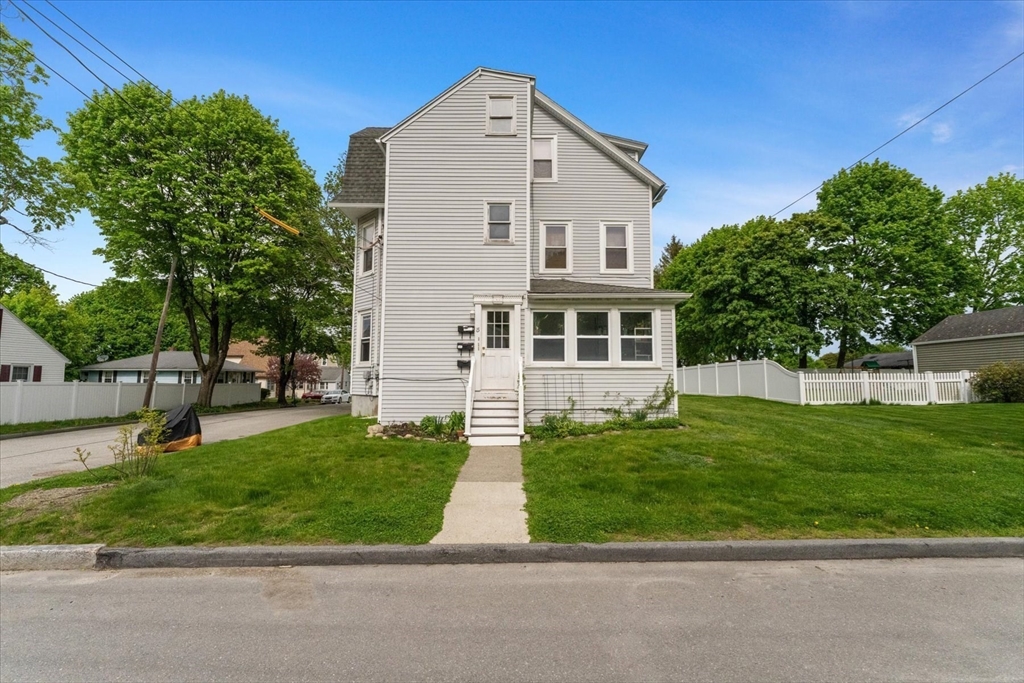 15 Steele Street Worcester, MA 01607 - Photo 1 of 42 a front view of a house with a yard