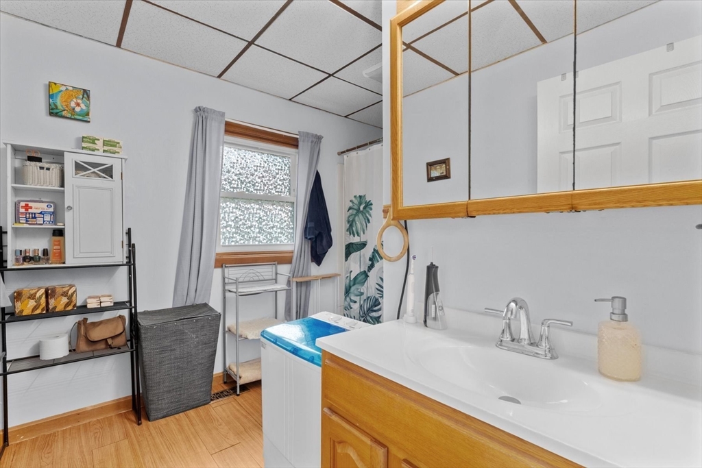 15 Steele Street Worcester, MA 01607 - Photo 11 of 42 a bathroom with a sink and a mirror