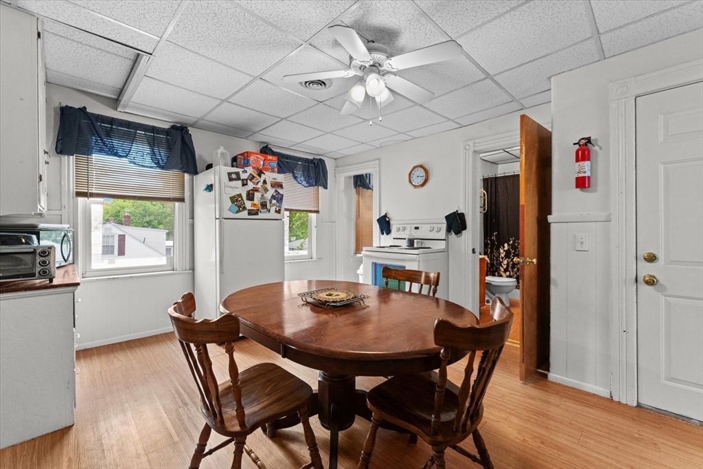 15 Steele Street Worcester, MA 01607 - Photo 21 of 42 a view of a dining room with furniture and wooden floor