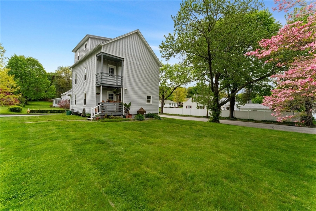 15 Steele Street Worcester, MA 01607 - Photo 35 of 42 a front view of house with garden