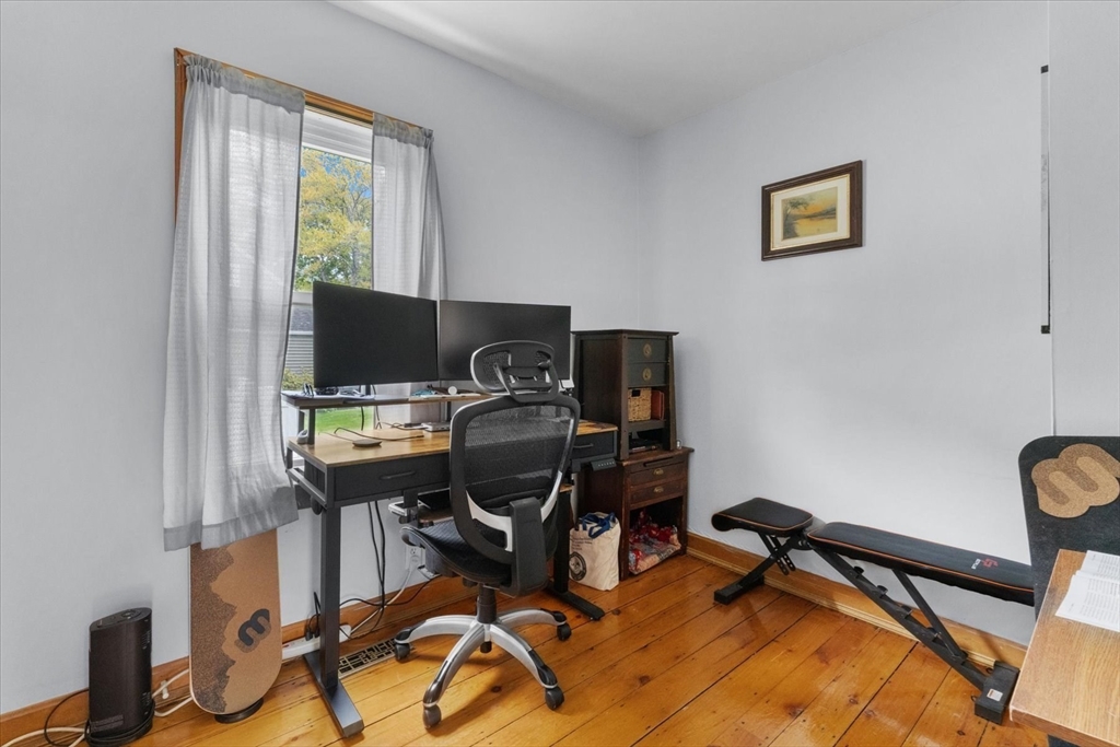 15 Steele Street Worcester, MA 01607 - Photo 9 of 42 a view of a workspace with furniture and a window
