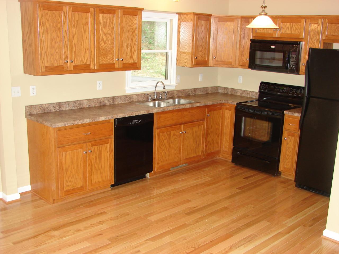 11 Silver Shadow Road Hardy, VA 24101 - Photo 3 of 18 a kitchen with granite countertop a sink cabinets and stainless steel appliances
