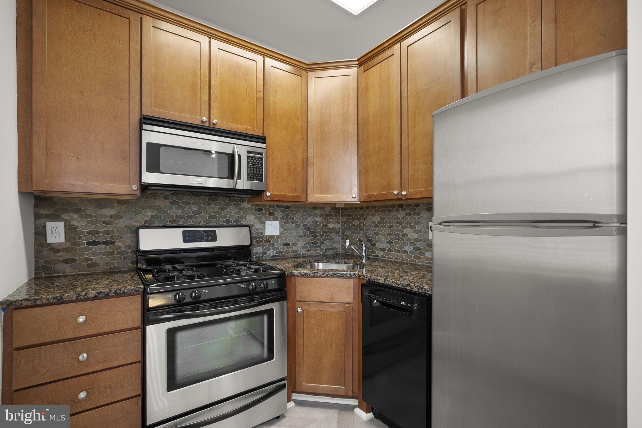 1816 Kalorama Road Northwest, Unit 304 Washington, DC 20009 - Photo 13 of 24 New stainless steel appliances