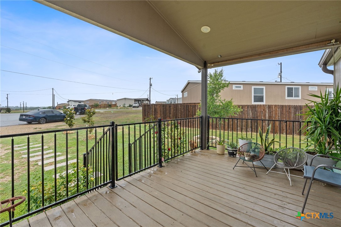 121 Fate Court Kyle, TX 78640 - Photo 3 of 23 a view of balcony with furniture