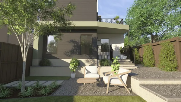 a view of a patio with table and chairs and potted plants