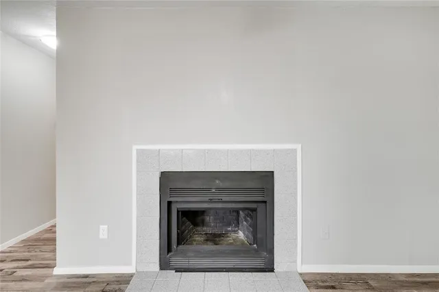 a living room with a fireplace