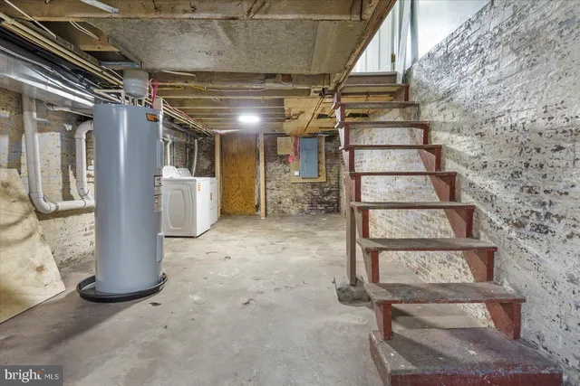 a view of a backyard with wooden fence