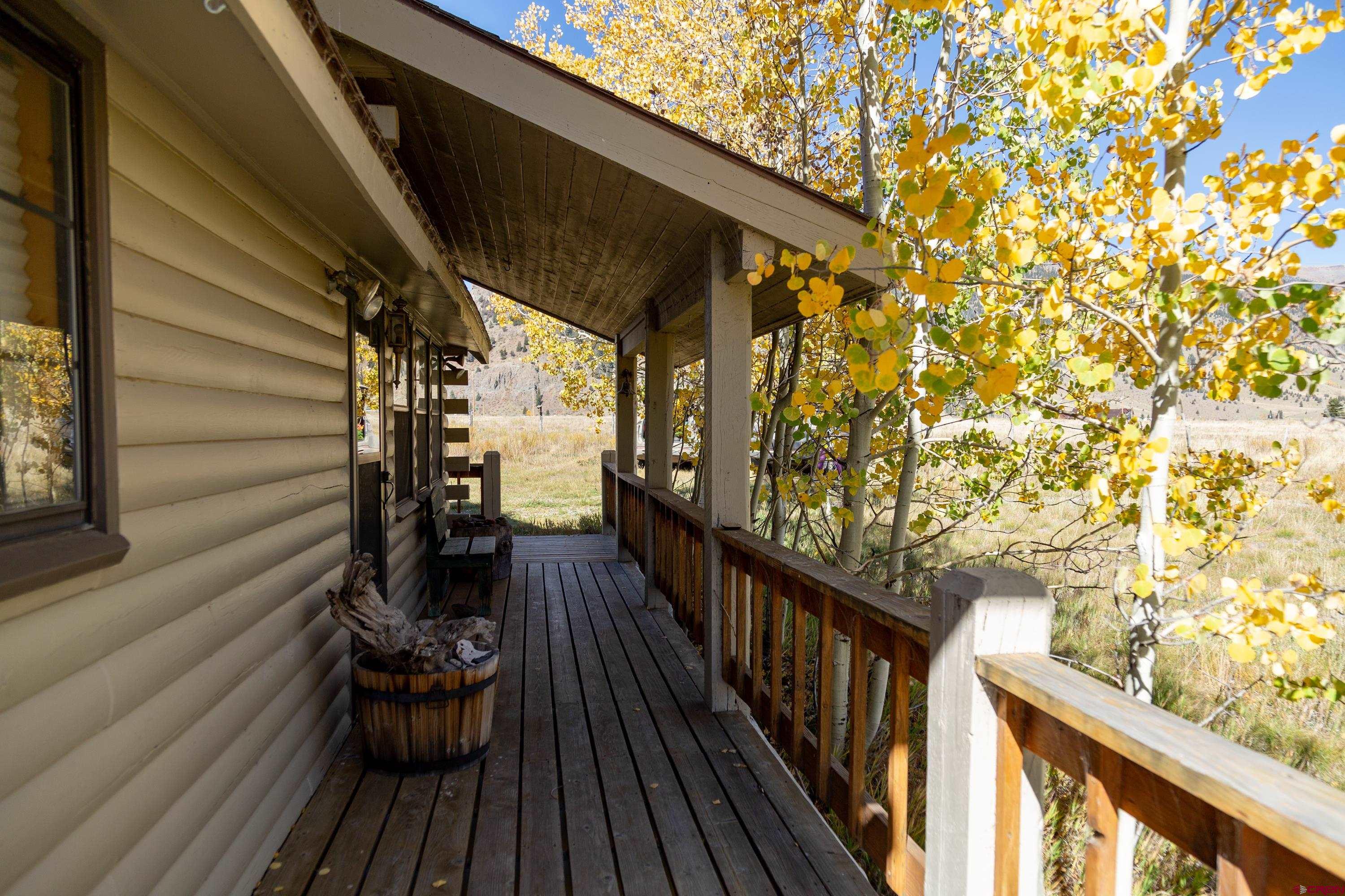 516 Rio Grande Court Creede, CO 81130 - Photo 25 of 33 a view of balcony with wooden floor and fence