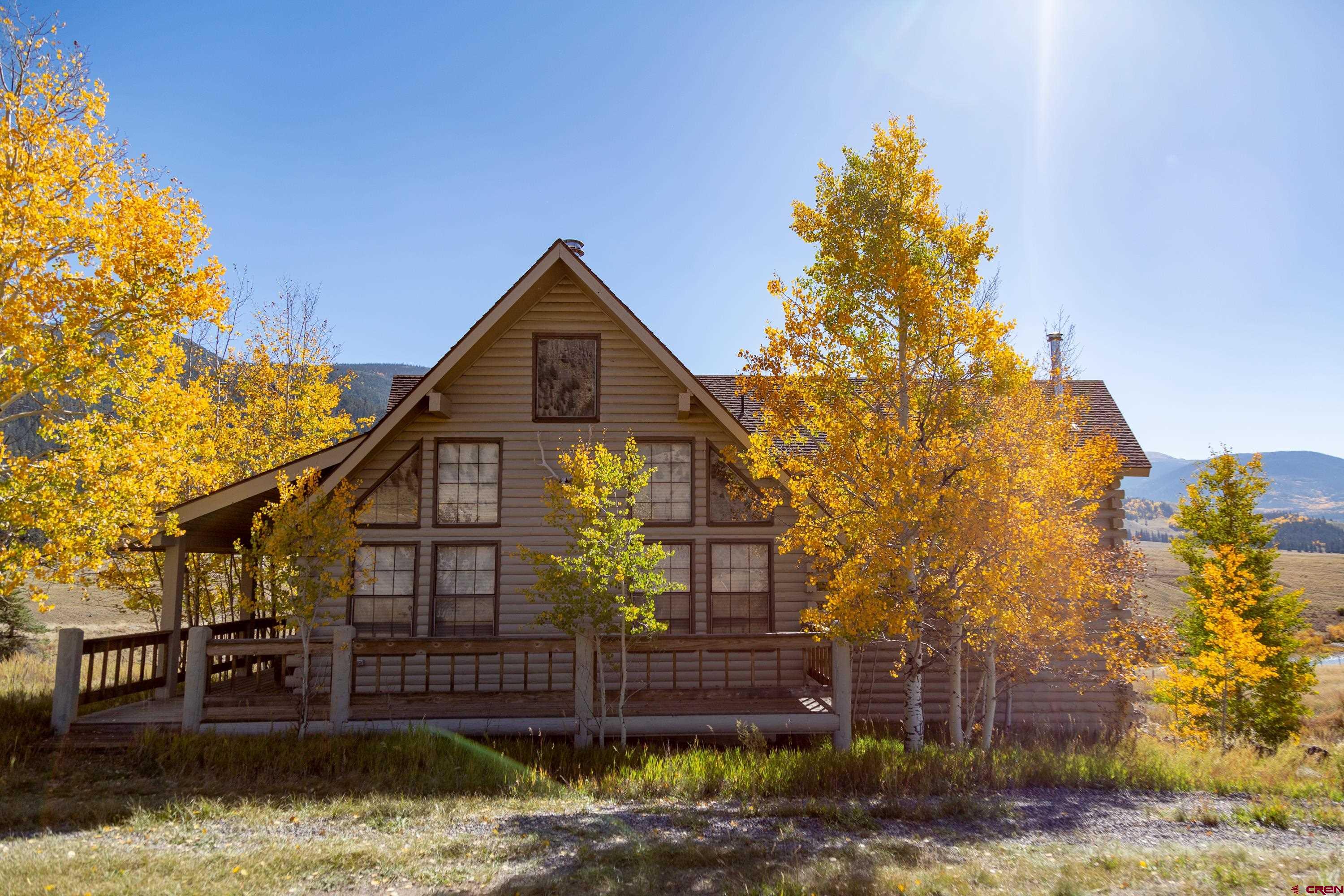 516 Rio Grande Court Creede, CO 81130 - Photo 27 of 33 a front view of a house with a yard