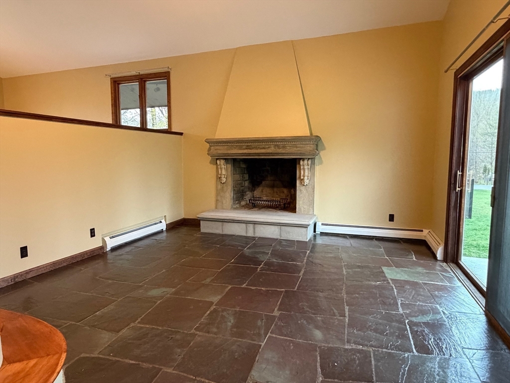 14 East Hawley Road Charlemont, MA 01339 - Photo 11 of 42 a view of an empty room with a window