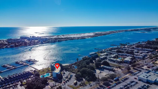 an aerial view of a houses with a lake view