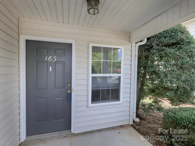 a view of house with outdoor space