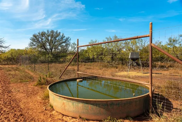 a ocean view with a bench
