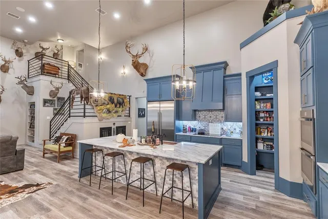 a view of a livingroom with furniture and a wooden floor