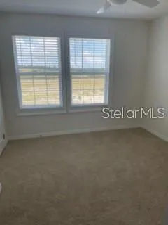 a view of balcony with wooden floor