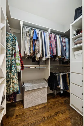 a bathroom with a granite countertop sink vanity and a mirror