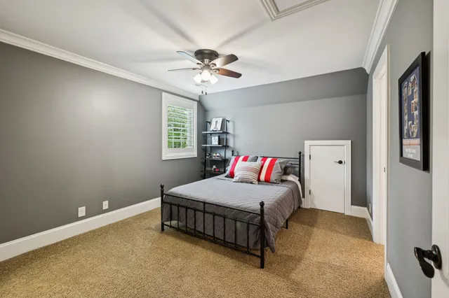 an aerial view of a house with outdoor space swimming pool