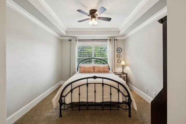 a view of house with swimming pool outdoor seating