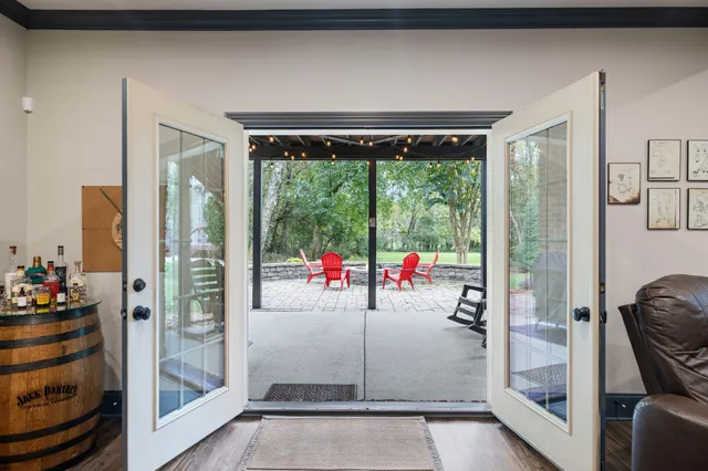 a view of a garden with an outdoor seating