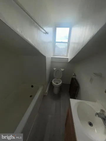 a bathroom with a sink and a toilet
