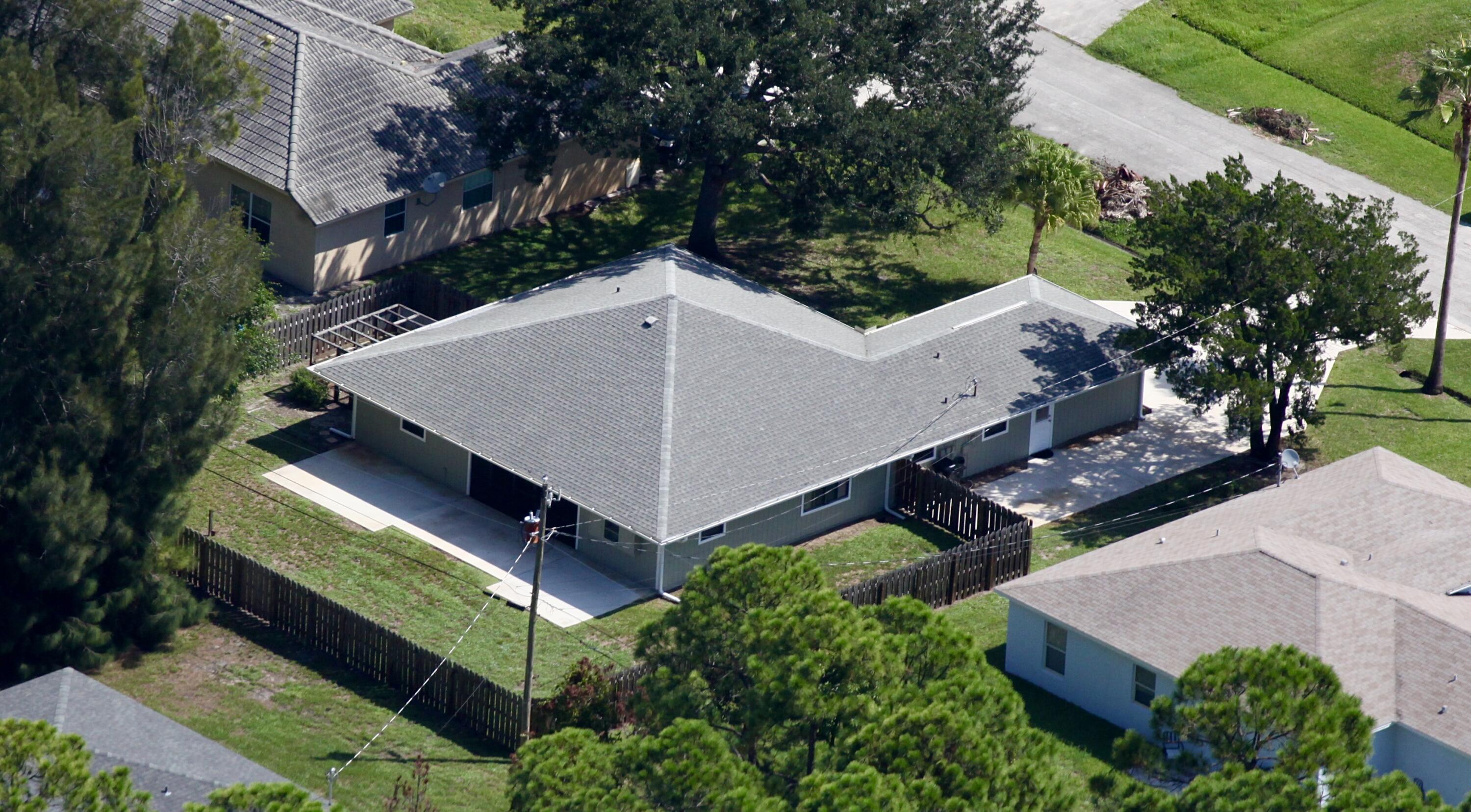 1045 Southwest Bay State Road Port St. Lucie, FL 34953 - Photo 1 of 62 0600E23D-3DBD-432D-93D5-E2B041B80636