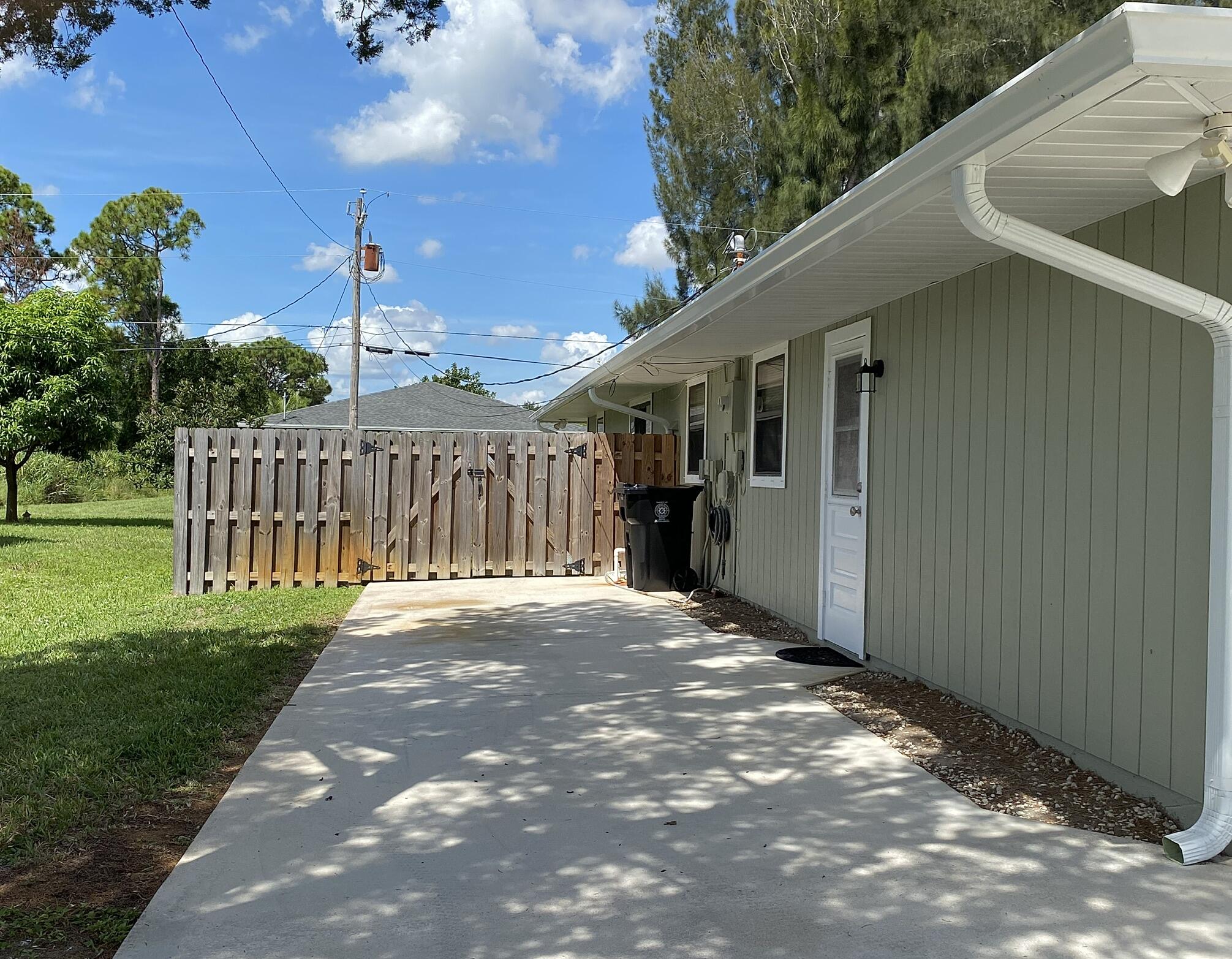 1045 Southwest Bay State Road Port St. Lucie, FL 34953 - Photo 12 of 62 68CEEC55-DE57-4D00-B40A-38EDAF7B684E